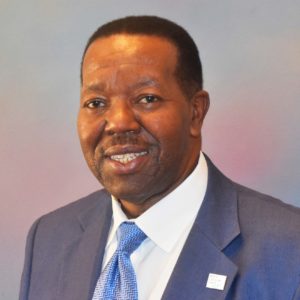 A professional headshot of Greg Washington, a North Carolina State Ports Authority Board Member.